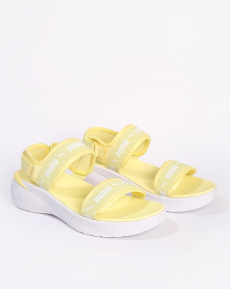 Puma slides womens sales yellow