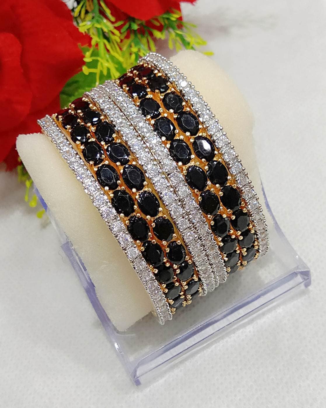 Black and store gold bangles set