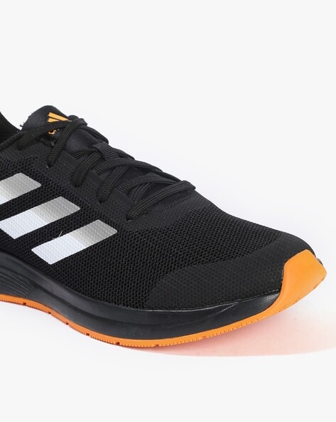 Adidas running shoes hotsell black and orange