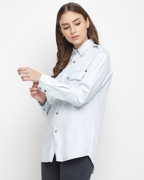 Why Women Over 40 Should Own A White Button Down Shirt