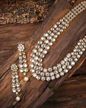Women by ZAVERI PEARLS 