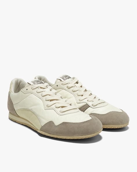 Comfortable Sneakers model shoes with a wide platform and cream color  details