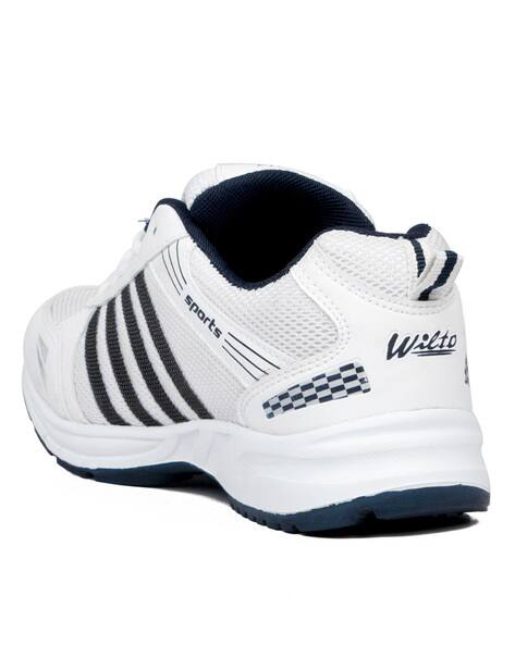 Buy White Sports Shoes for Men by ASIAN 