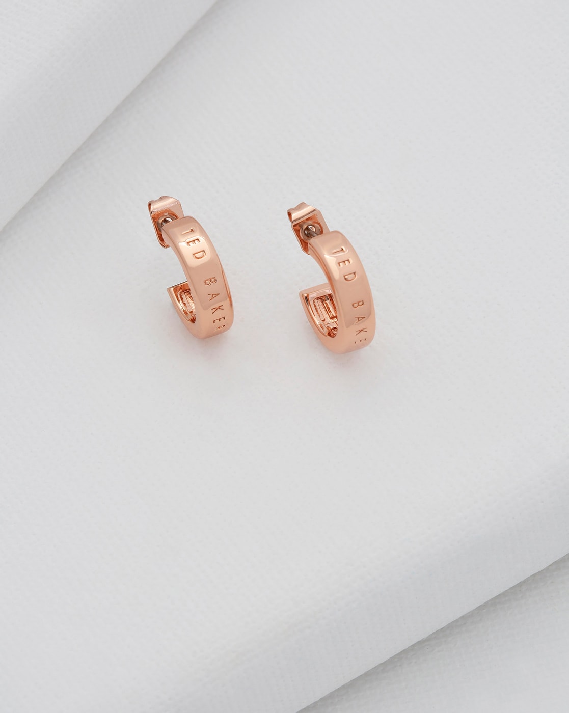 大勧め テッドベーカー レディース ジュエリー イヤリング Ted Baker Helanna logo hoop earrings in rose  gold www.francobaukft.hu