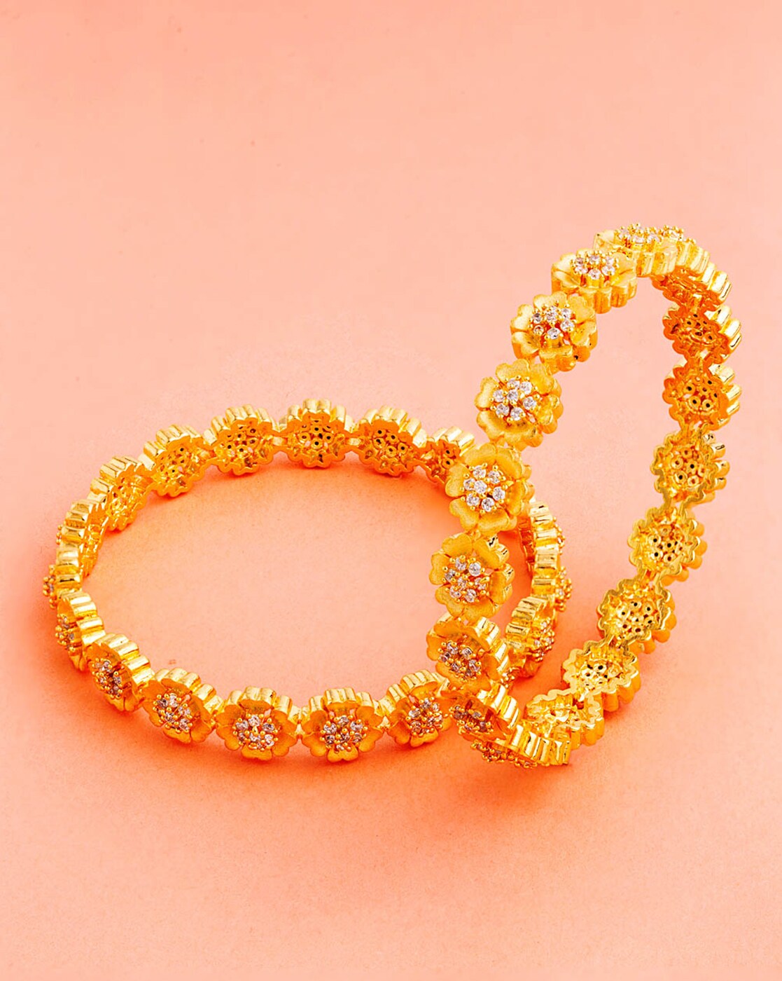 Shimmering Floret CZ Golden Round Brass Mangalsutra Bracelet – VOYLLA