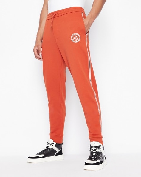 Pants and jeans adidas Firebird Track Pants Orange | Footshop