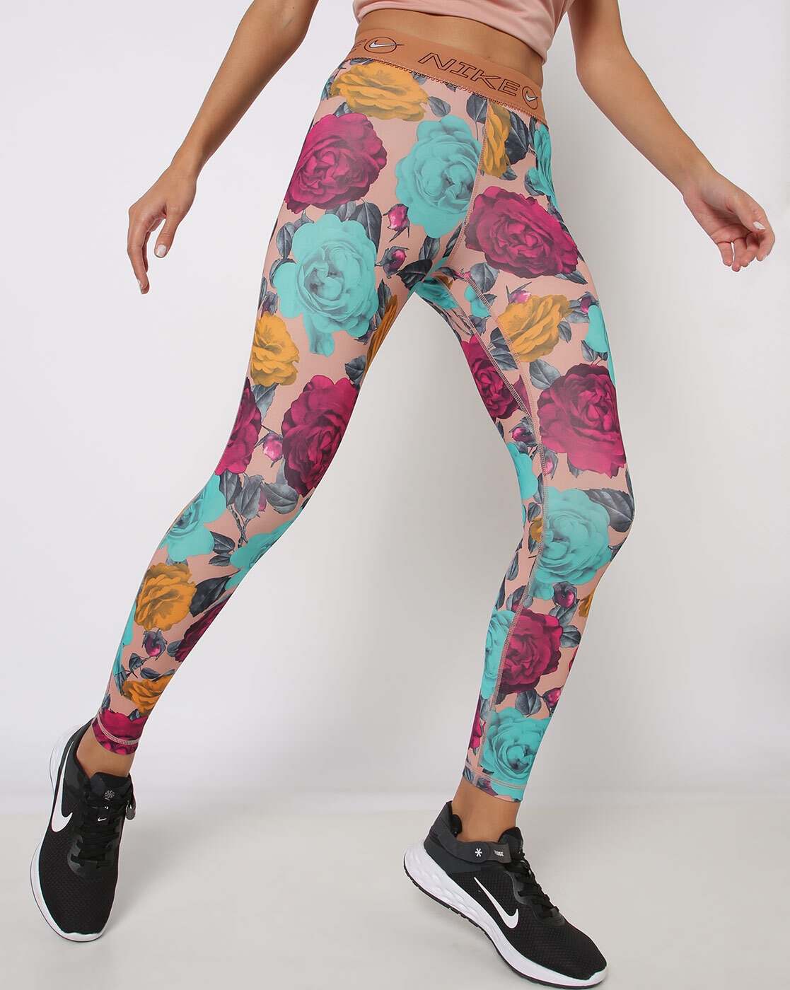 Nike Fast Swoosh Women's Mid-Rise 7/8 Printed Running Leggings with  Pockets. Nike VN