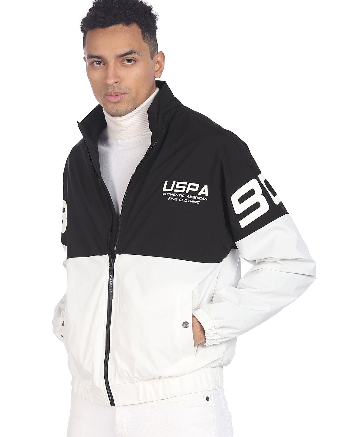 Black and on sale white polo jacket