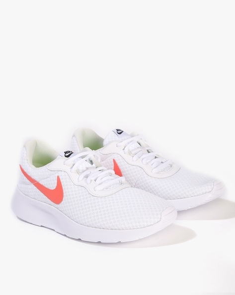 Nike tanjun hot sale orange