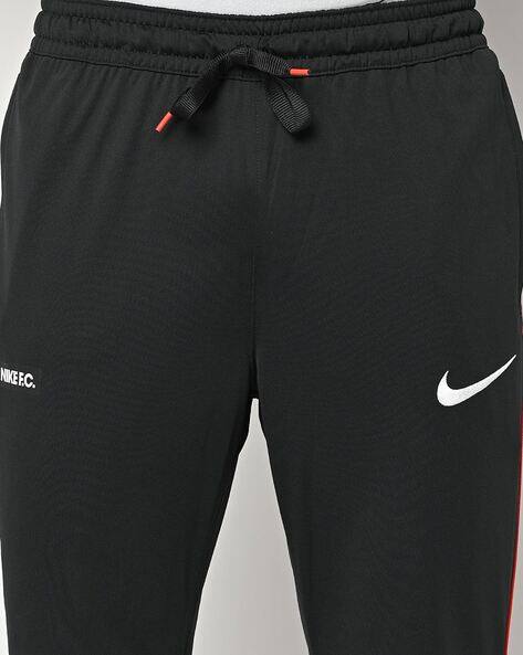 Buy Black Track Pants for Men by NIKE Online
