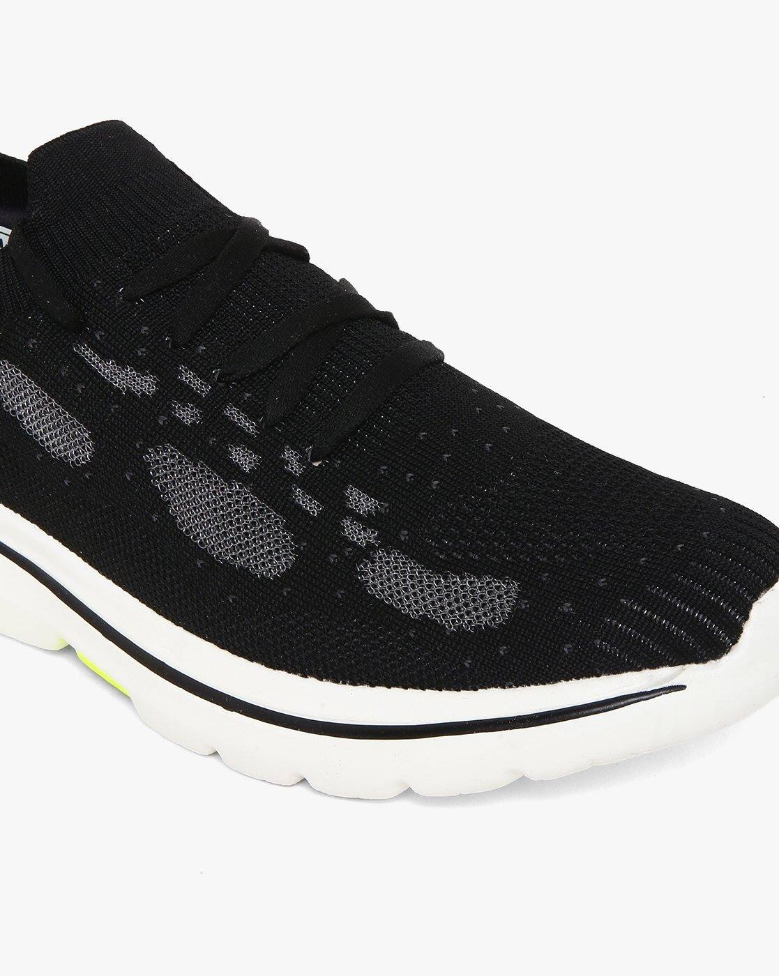 black shiny tennis shoes