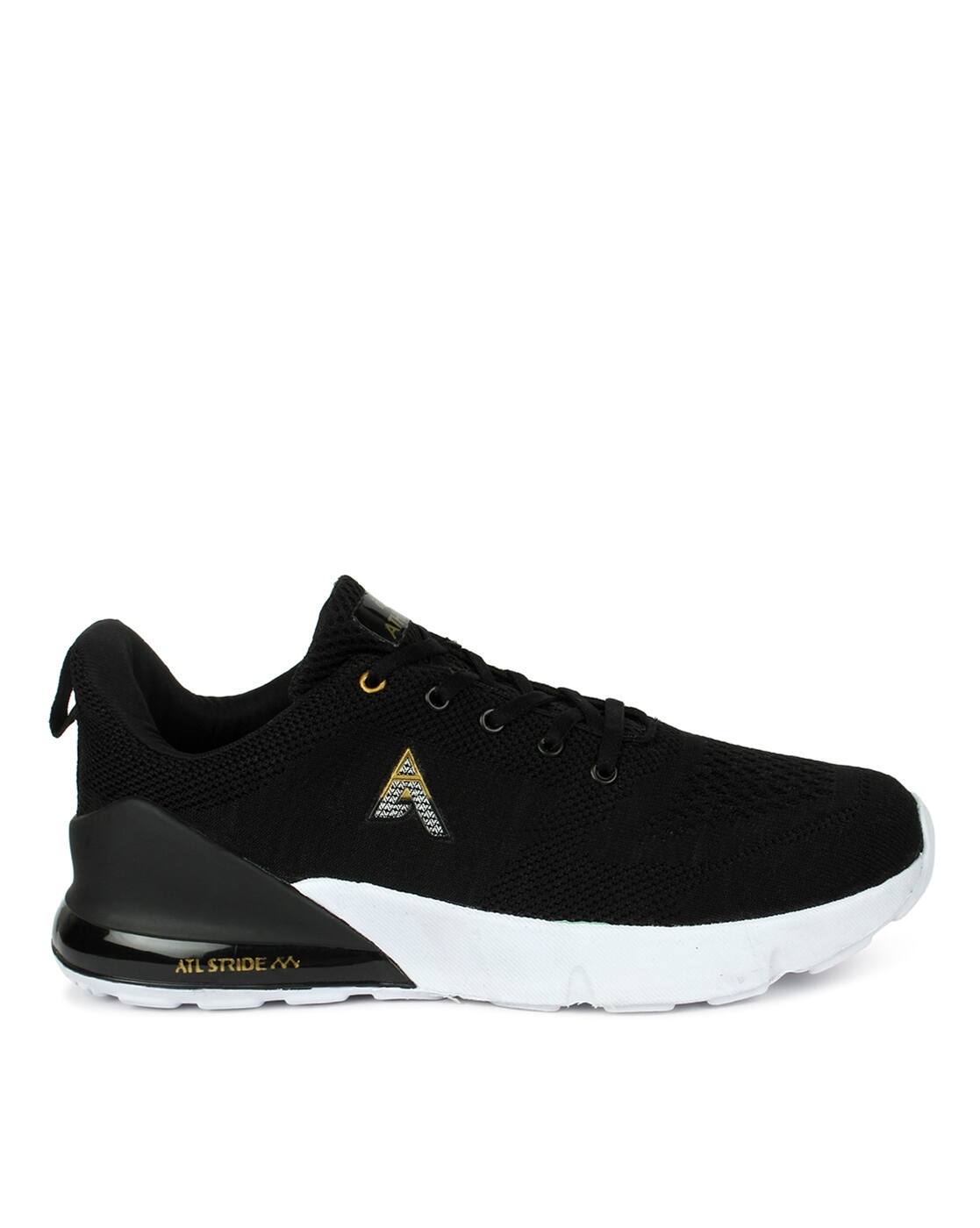 Buy Black Sports Shoes for Men by 