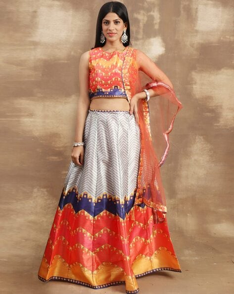 Photo of turquoise and orange mehendi lehenga