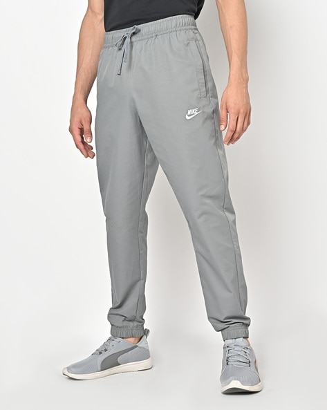 Buy Grey Track Pants for Men by Reebok Online | Ajio.com