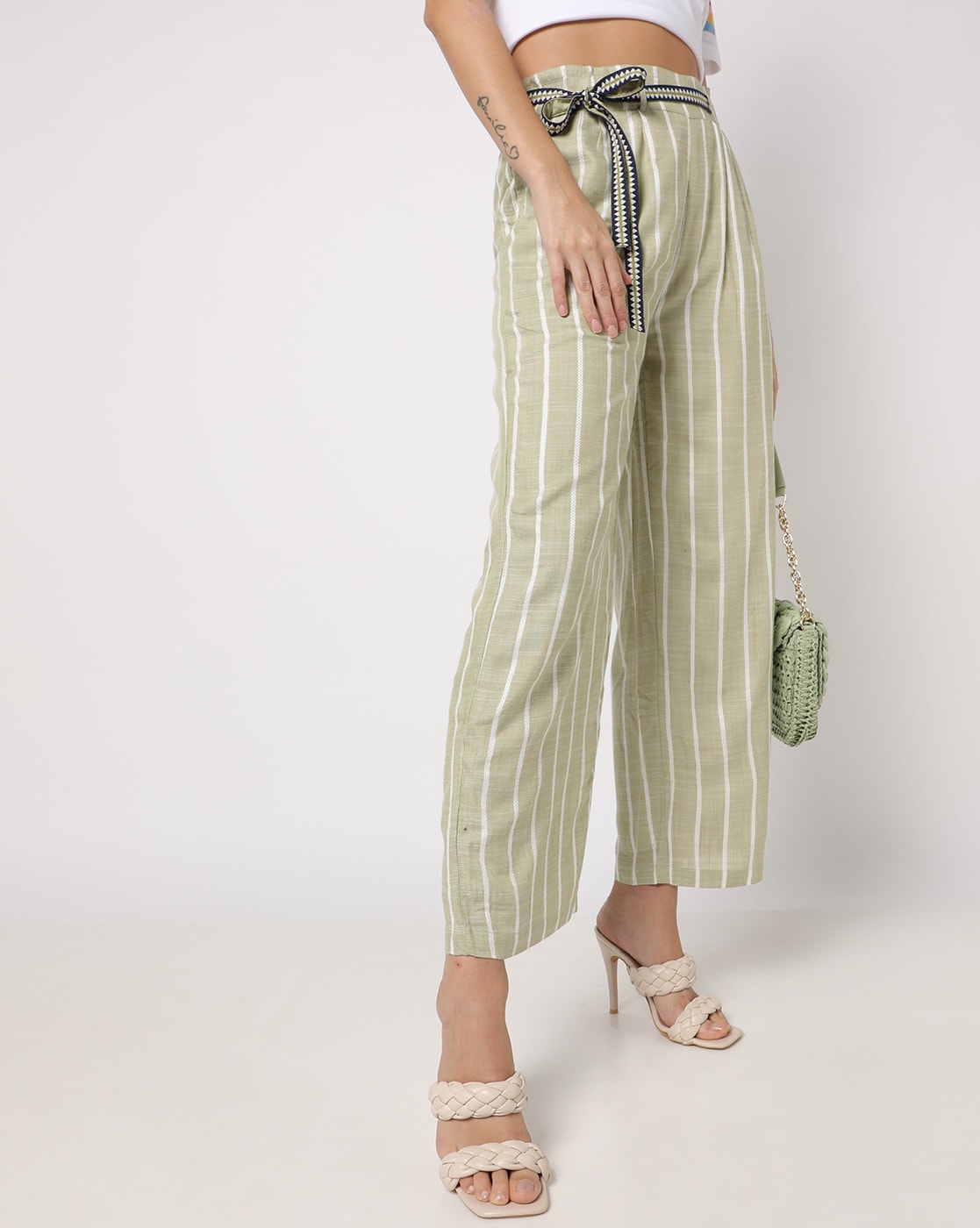 Buy Online Women Gorgeous Green Striped Volume Play Trousers at best price   Plussin