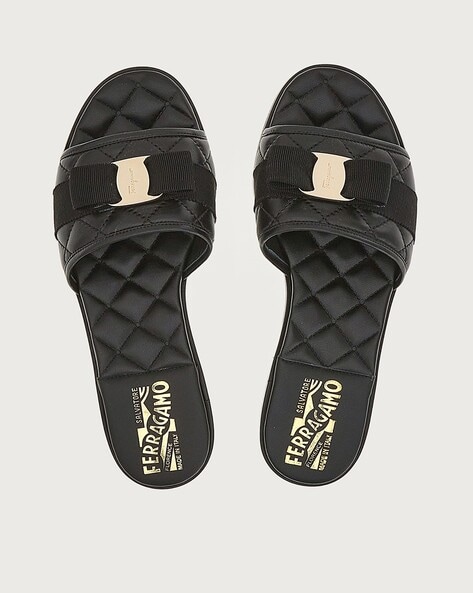 Black and 2025 gold ferragamo slides