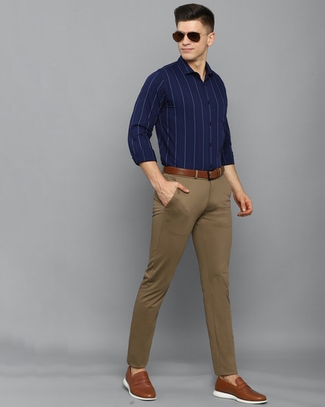 Men's Navy Long Sleeve Shirt, Khaki Chinos, Dark Brown Sunglasses, Black  Bracelet | Mens fashion rugged, Mens fashion, Mens fashion blog