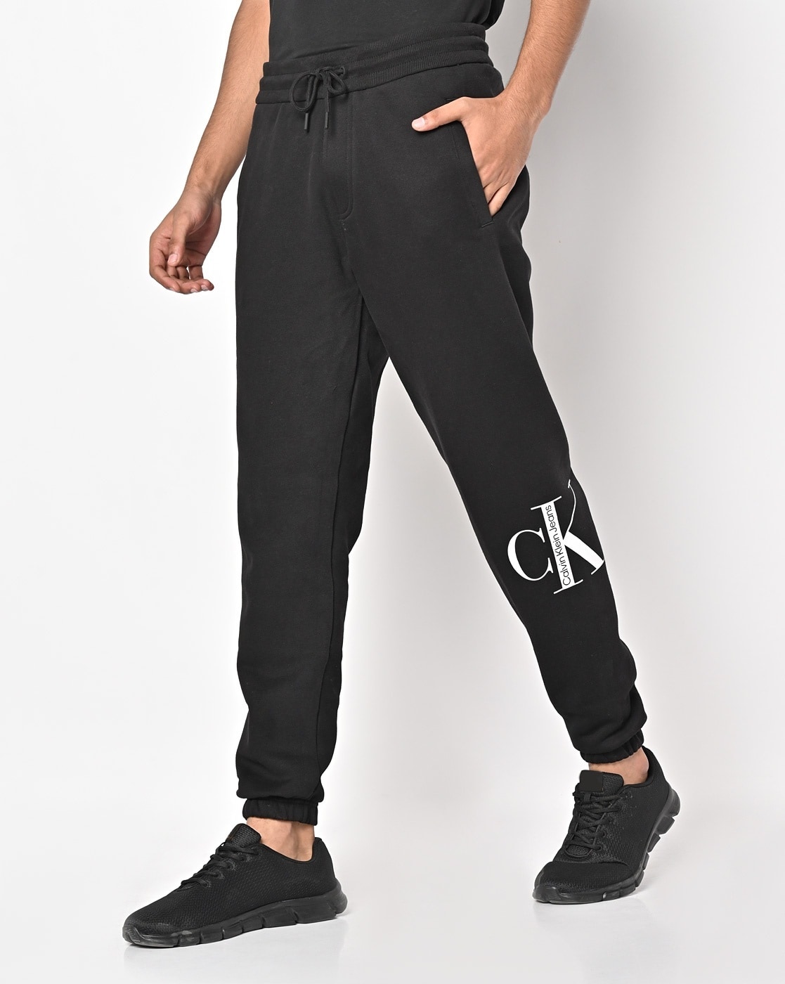 Buy Calvin Klein Men Khaki Mid Rise Solid Track Pants  NNNOWcom