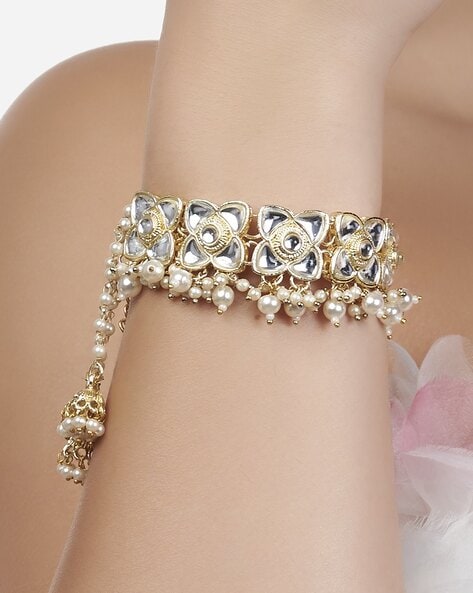 Buy Zaveri Pearls Women Gold Toned Alloy Gold Plated Ring Bracelet -  Bracelet for Women 6941107 | Myntra