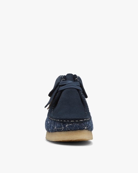 Navy blue clarks clearance wallabees