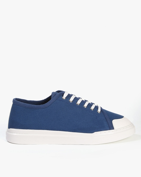 Step into Style: The Ultimate Guide to Dark Blue and White Shoes