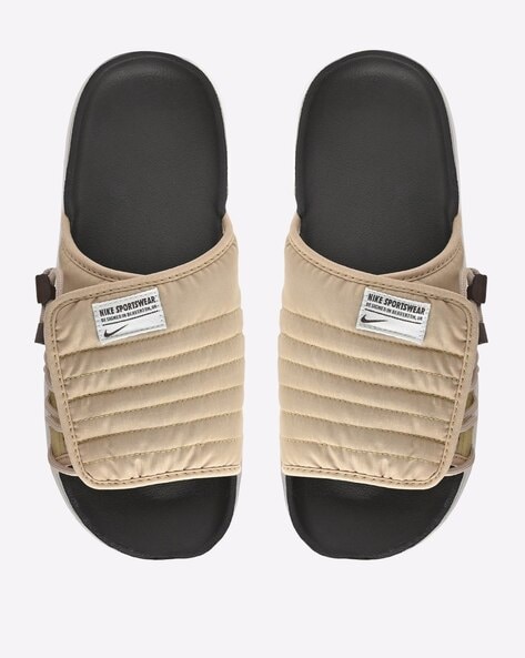 Beige best sale nike slides