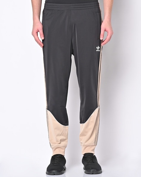 Buy Black Cream Track Pants for Men by Adidas Originals Online