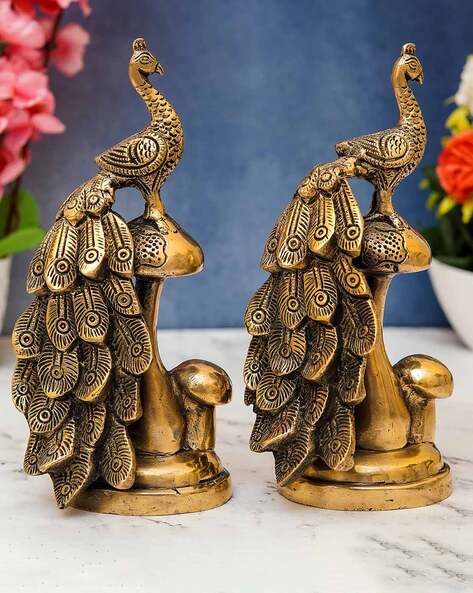 Buy Gold Showpieces & Figurines for Home & Kitchen by