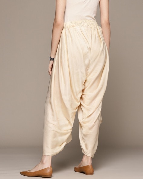 White Linen Dhoti Pants Design by Wendell Rodricks Men at Pernias Pop Up  Shop 2023
