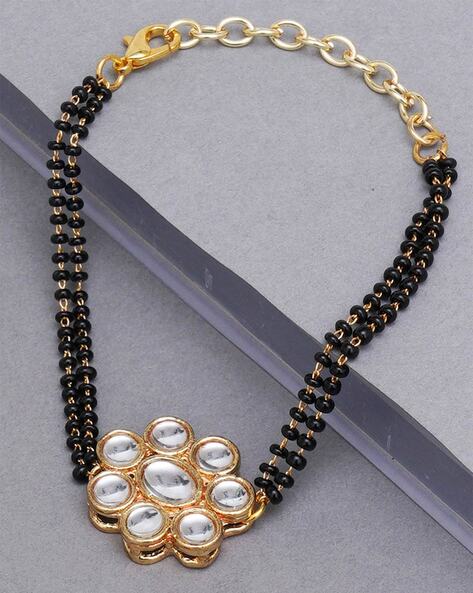 Buy LOVELY Black Stone Mangalsutra Bracelet Gold Plated With Chain Gold AD  Diamond Ball Online in India - Etsy