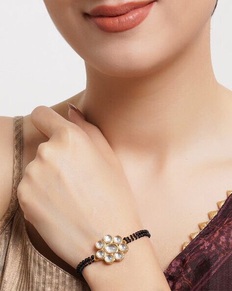 Buy Zivom Evil Eye Customised Alphabet Initial Letter D Baguette Cubic  Zirconia 22K Gold Hand Mangalsutra Bracelet For Women Online at Best Prices  in India - JioMart.