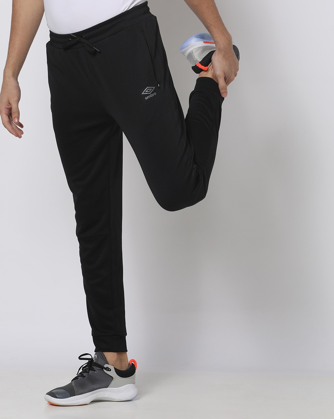 Buy Umbro Men Black Track Pants - Track Pants for Men 278261 | Myntra