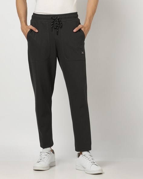 Buy Lee Cooper Men Navy Solid Joggers - Track Pants for Men 8342381 | Myntra