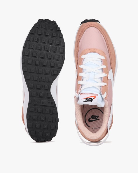 Nike store blush trainers