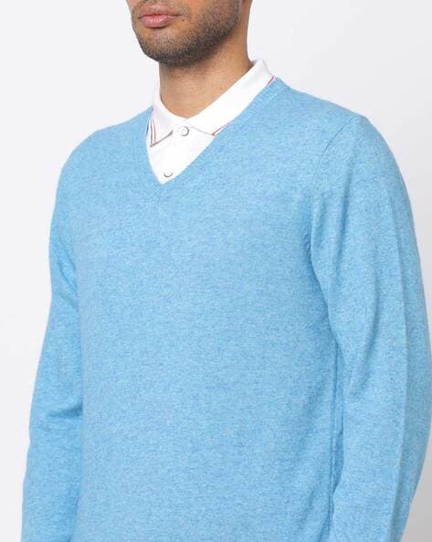 White shirt best sale blue sweater