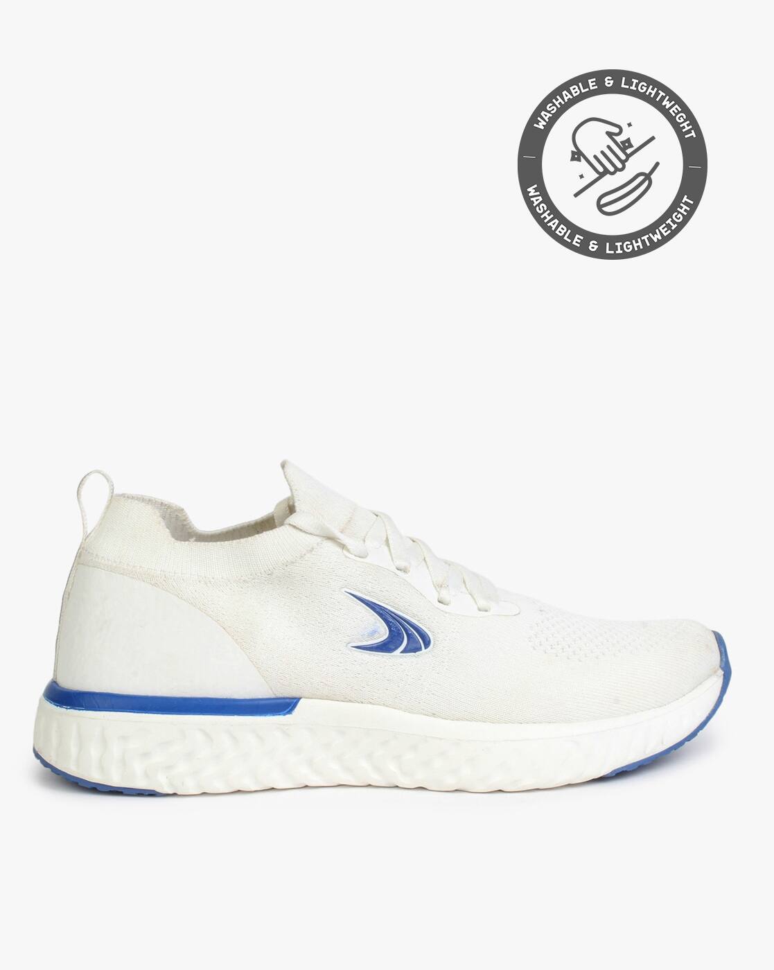 Buy White Sports Shoes for Men by 