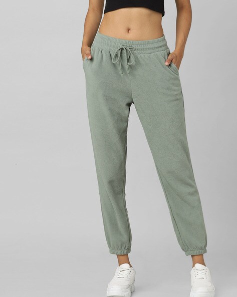 Buy Skechers Skechers Women Grey Solid Track Pants at Redfynd