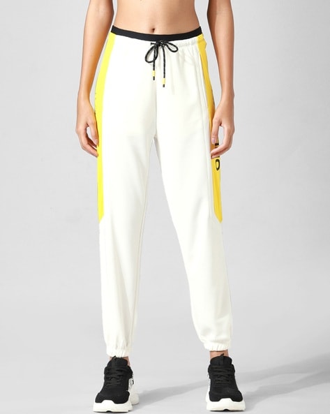 Buy Cloud Dancer Track Pants for Women by ONLY Online