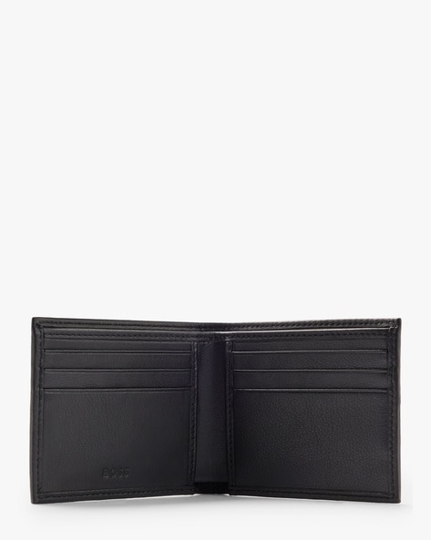 Gucci Monogram Embossed Wallet in Black for Men