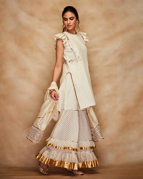 Buy Off White Net Panelled Gharara Pants For Women by Mandira Wirk Online  at Aza Fashions.