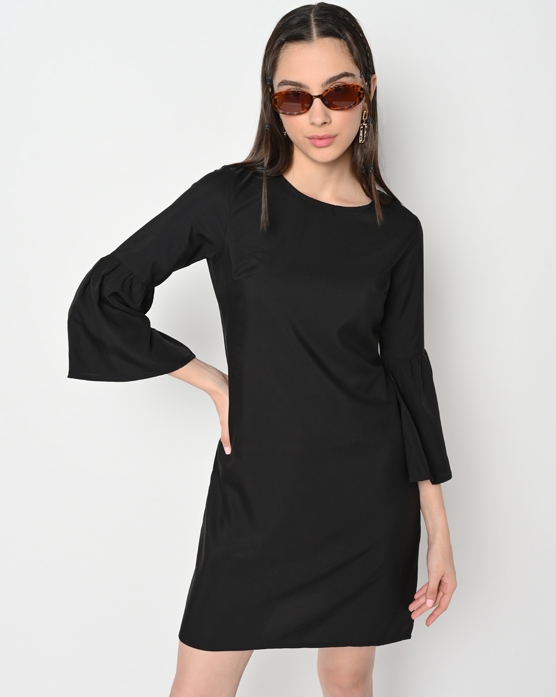 black dress with flowing sleeves