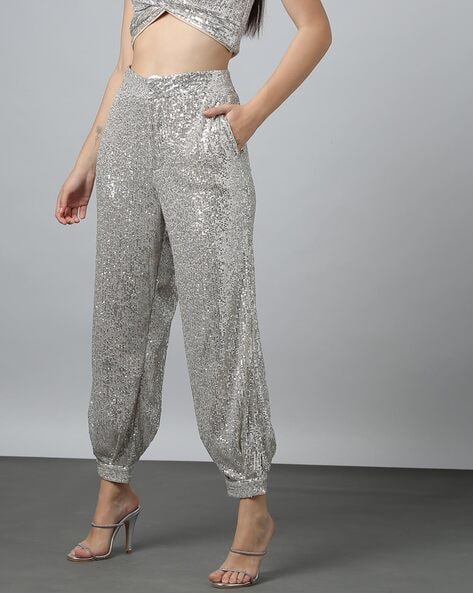 Flared sequined trousers  SilvercolouredSequins  Ladies  HM IN