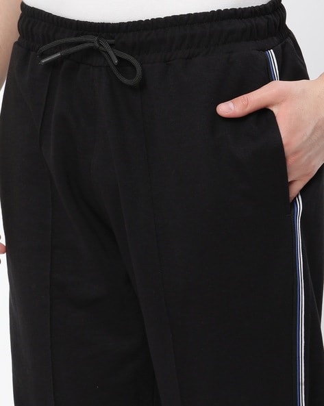 Buy Black Track Pants for Men by Spunk Online Ajio