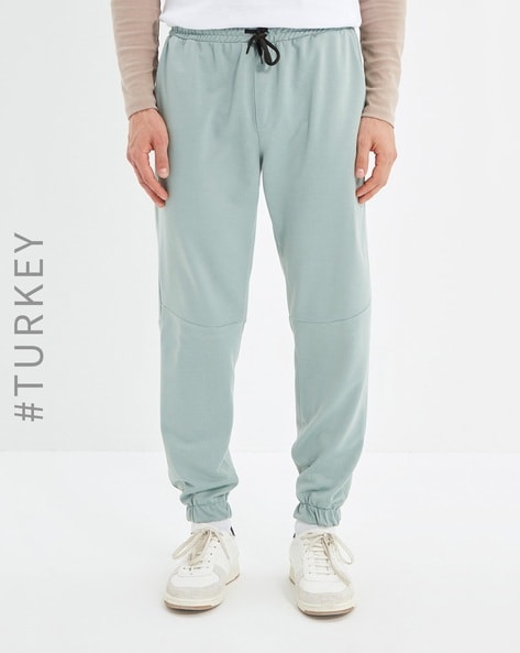 Buy Mint Blue Track Pants for Men by TRENDYOL Online Ajio