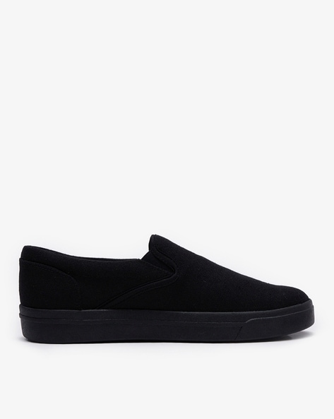 All black slip on sneakers online