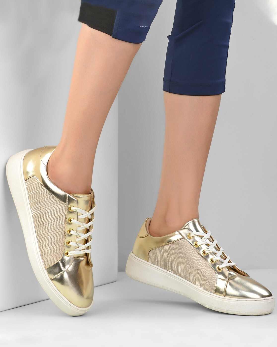 Buy Gold Sneakers for Women by EL PASO Online | Ajio.com
