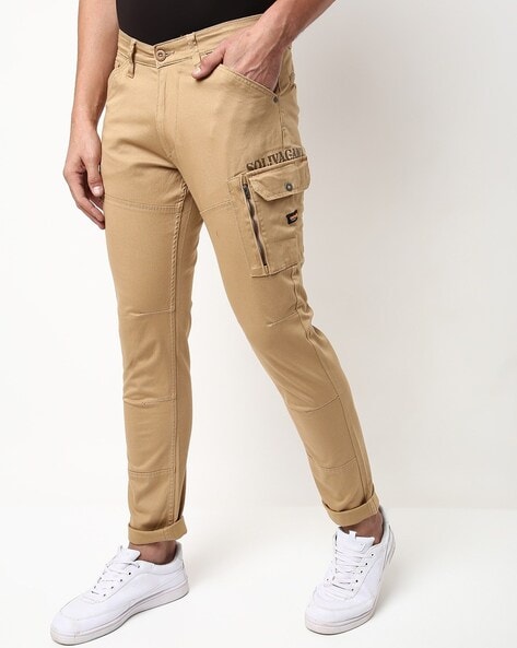 Buy OnlineSpykar Men Light Khaki Cotton Slim Fit Ankle Length Plain  Trousers