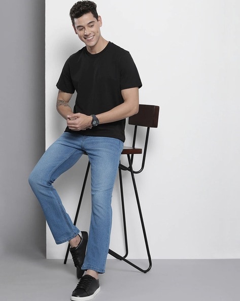Blue Distressed bootcut jeans | Balenciaga | MATCHES UK