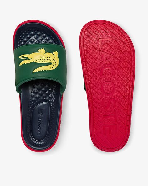 Lacoste slides big discount logo