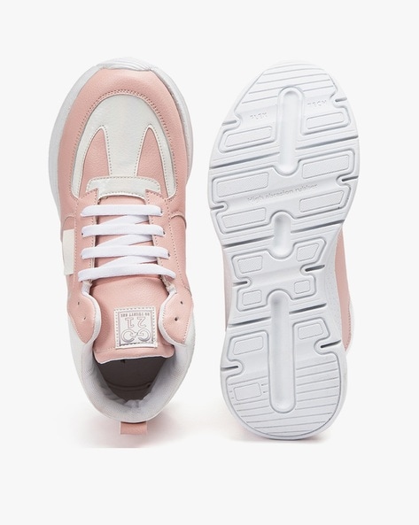 Roze sneakers dames online nike